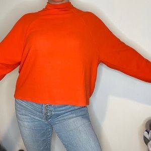 H&M orange mock neck sweater.